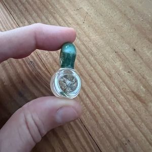 Glass pendant with shells and sand